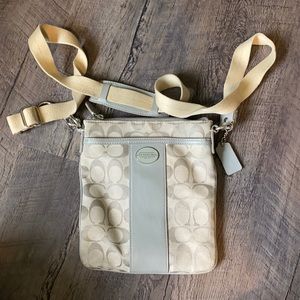 Coach cross body purse.